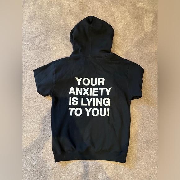 Your Anxiety is Lying to You hoodie from brand We’re Not Really Strangers. - Picture 3 of 5